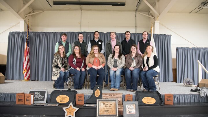 A livestock judging team on stage.